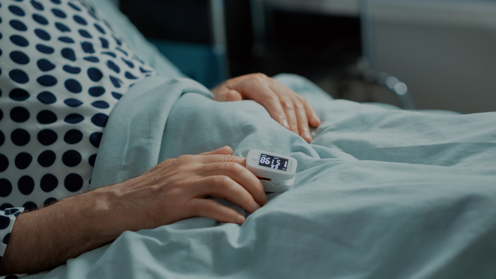 A patient resting in a hospital bed